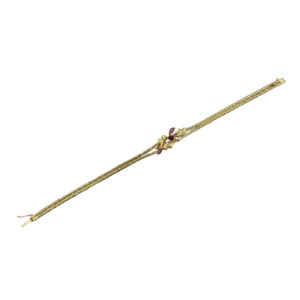 Zlatý náramek s fialovými kameny